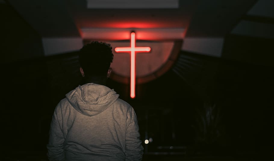 man facing red LED cross, man standing in front of church, person, HD wallpaper