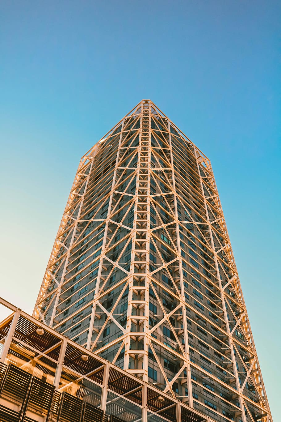 worm's-eye view photography of brown concrete high-rise building, low angle photography of brown building HD wallpaper