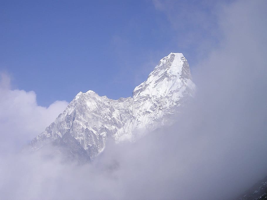 white mountain covered with snow during daytime, himalayas, ama dablam