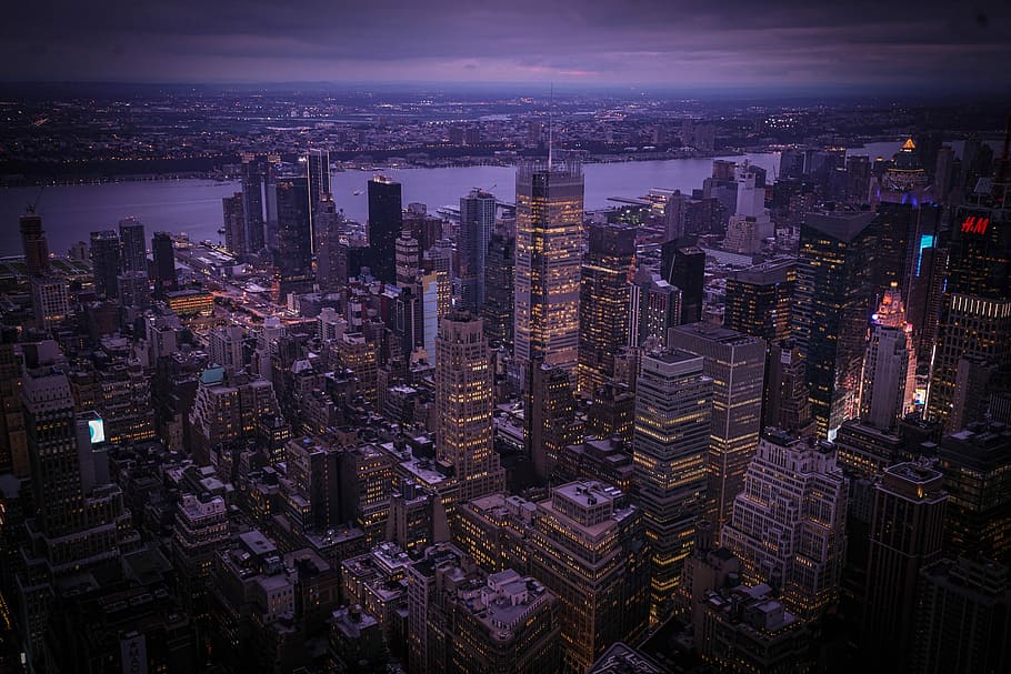 aerial photo of New York City during night, bird's-eye view photography of city buildings near body of water, HD wallpaper