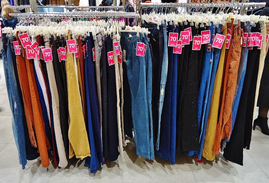 assorted denim jeans on gray metal rack, pants, shop, store HD wallpaper