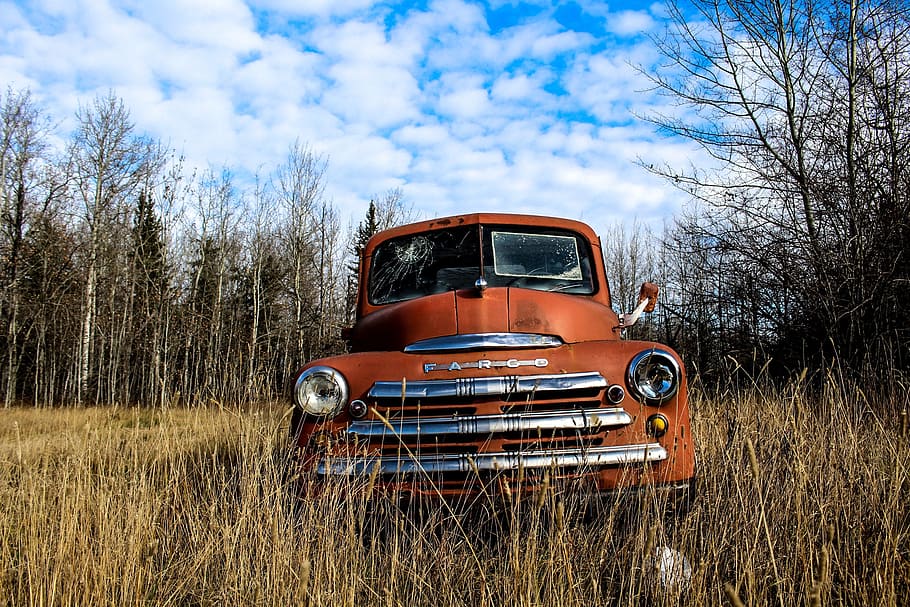 orange classic car on wood under blue sky and white clouds during daytime, HD wallpaper