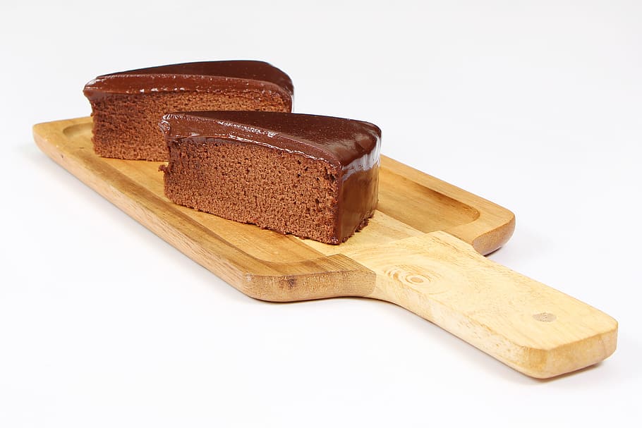 two slices of chocolate cake on brown chopping board, Swede, Bread