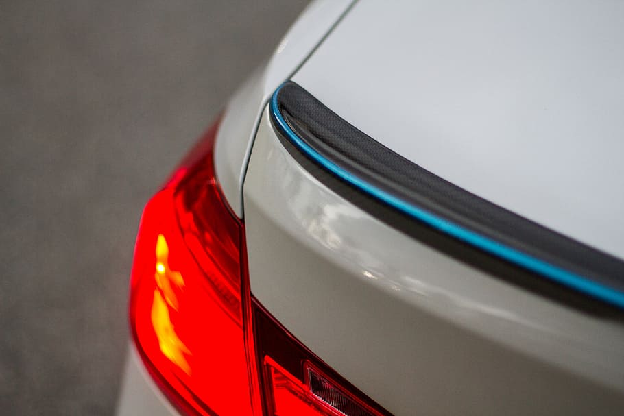 red car taillight, macro shot photography of car taillight, tail light HD wallpaper