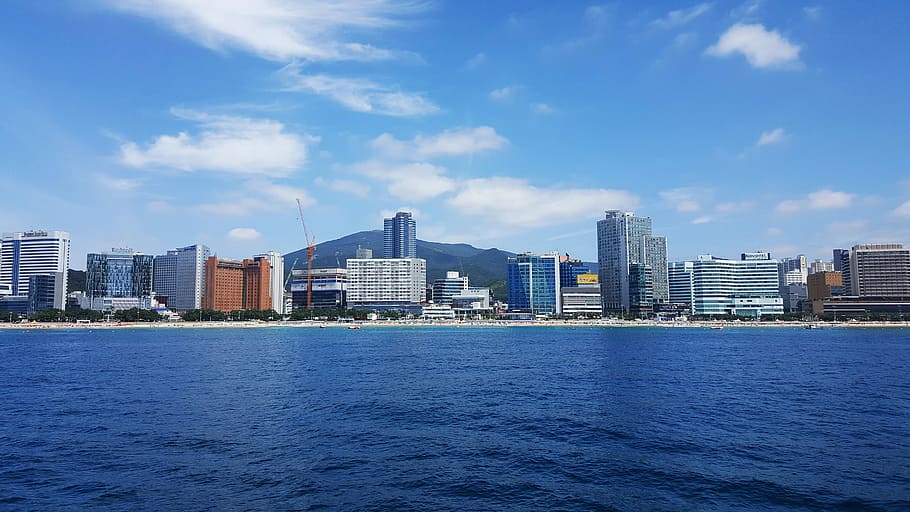 Skyline of Busan across the water in South Korea, building, clouds, HD wallpaper