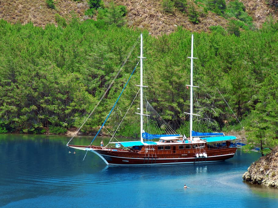 brown and white boat near trees, marmaris, marine, blue, yacht