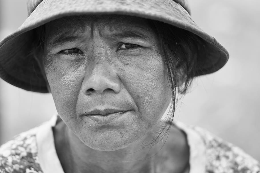 grayscale photo of woman wearing bucket hat, women's, documentary