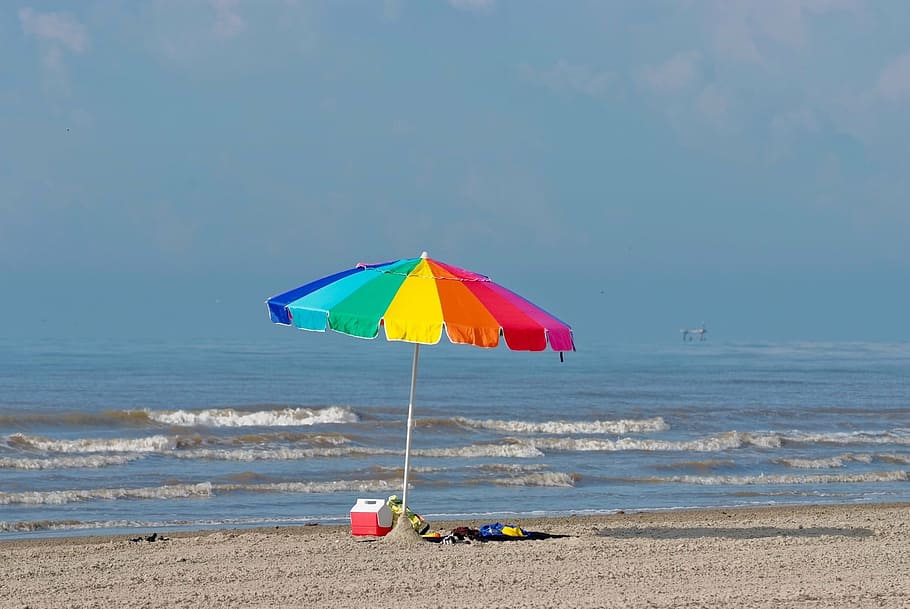 multicolored beach umbrella near beach, sand, colorful, sunbathers
