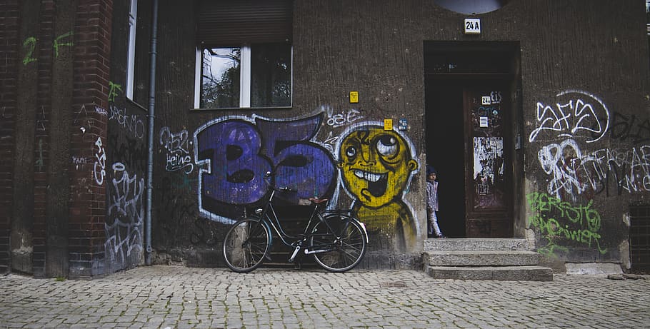 black bicycle parked near brown wall, photography building facade HD wallpaper