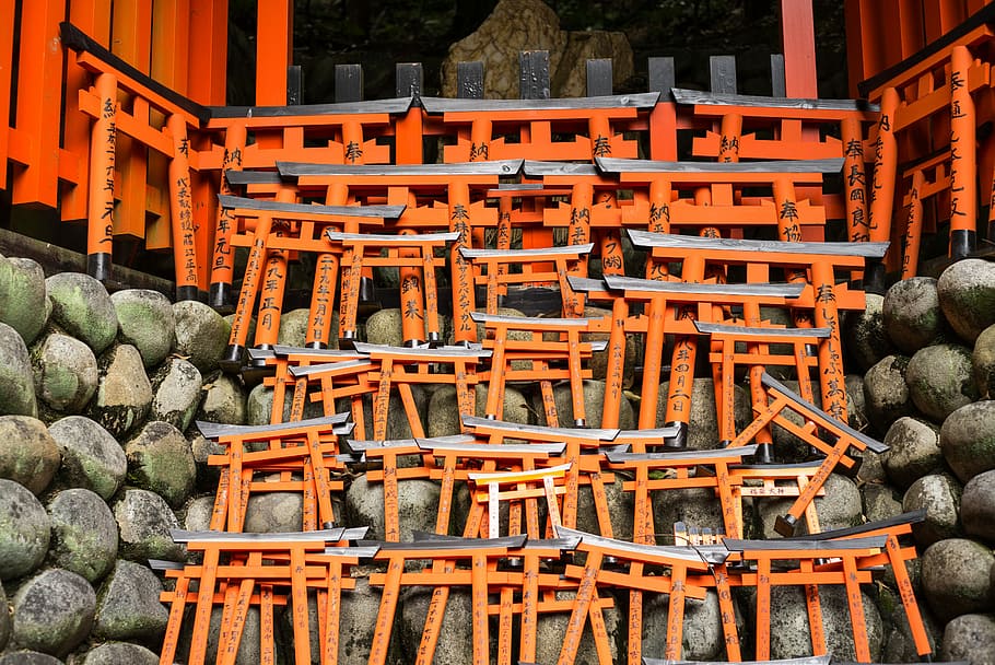 Lost in the Wilderness, orange wooden tori gates on gray wall HD wallpaper
