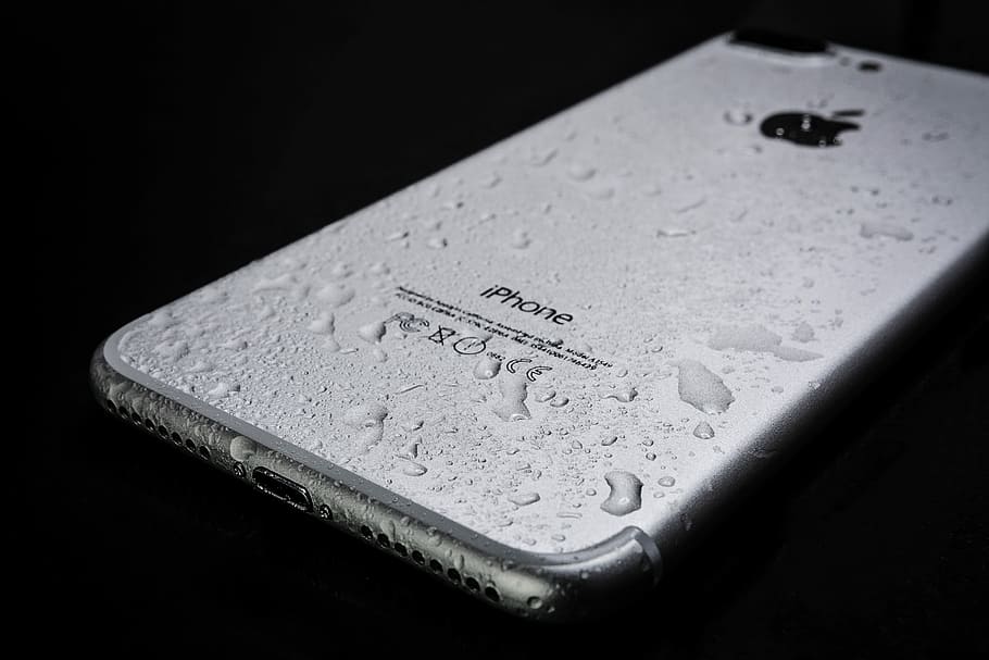 silver iPhone 7 Plus with water droplets, wet smartphone, apple