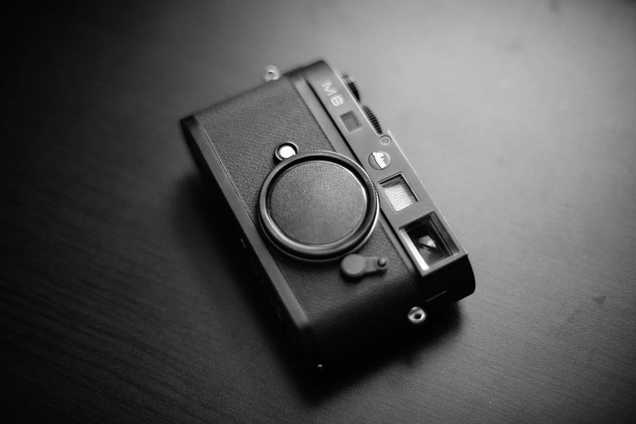 grayscale photo of M8 camera on table, grayscale photography of camera on top of furniture HD wallpaper