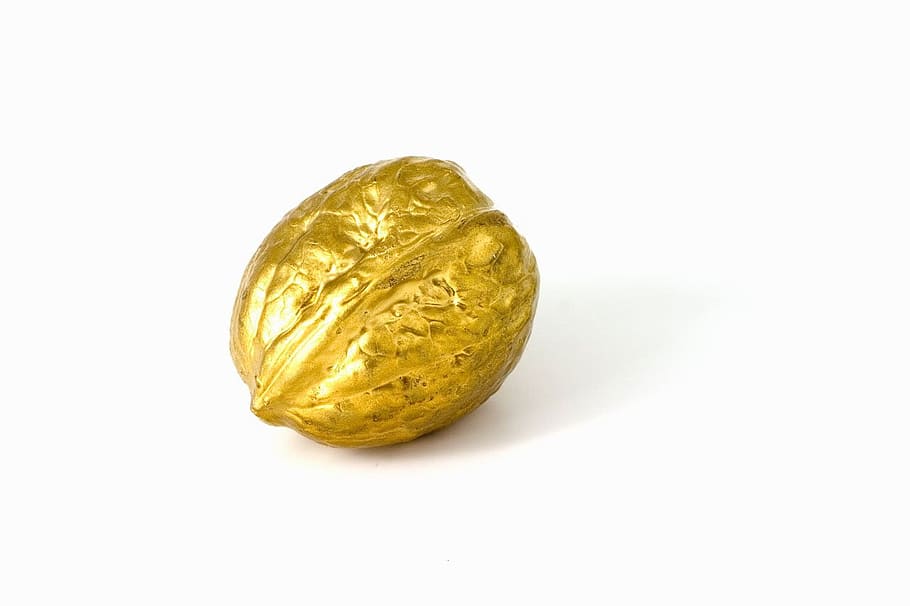 gold-color nut on white surface, walnut, christmas, decoration HD wallpaper