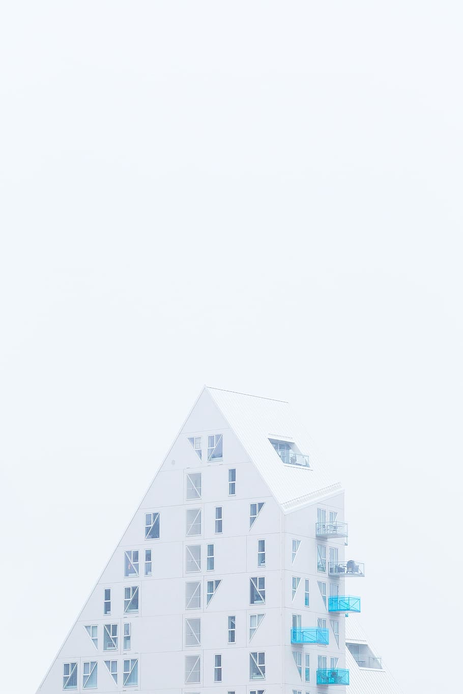 The iceberg, minimalist photography of triangular high-rise building HD wallpaper
