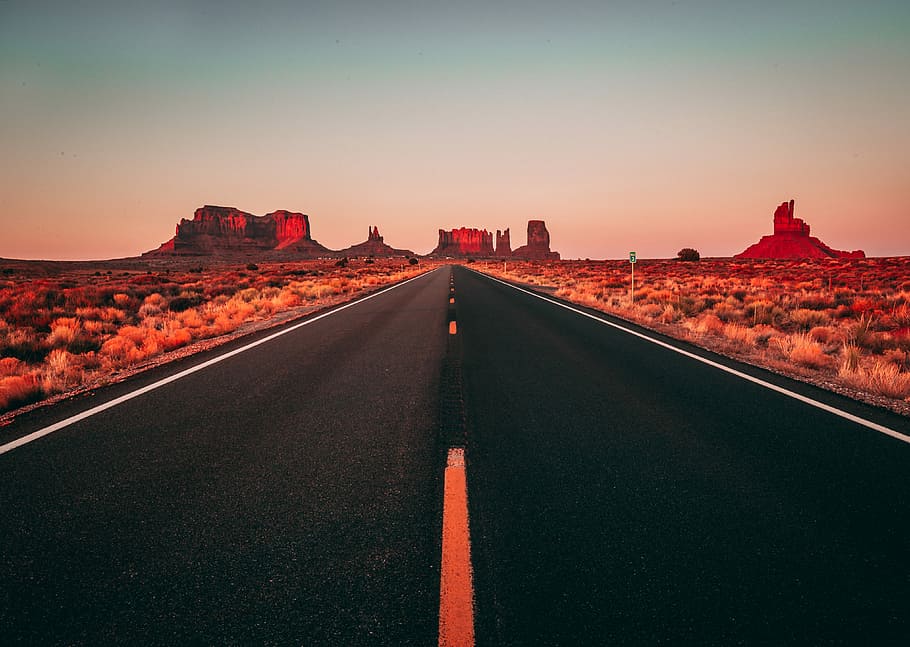 long exposure of black concrete road, black concrete road between dried plant fields HD wallpaper