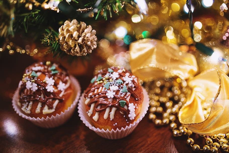 two cupcakes near brown pinecone, muffin, muffins, cookies HD wallpaper