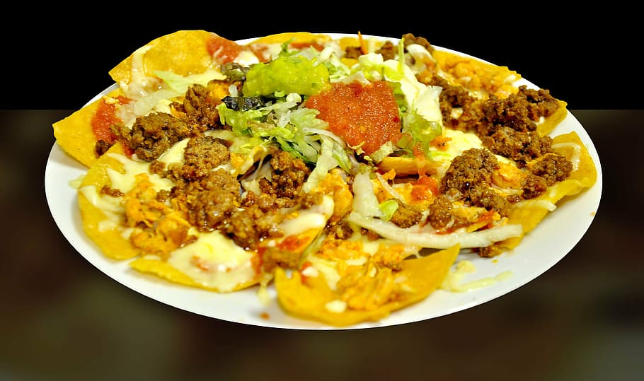 photography of cooked food in plate, mexican, beef cake, mexican food
