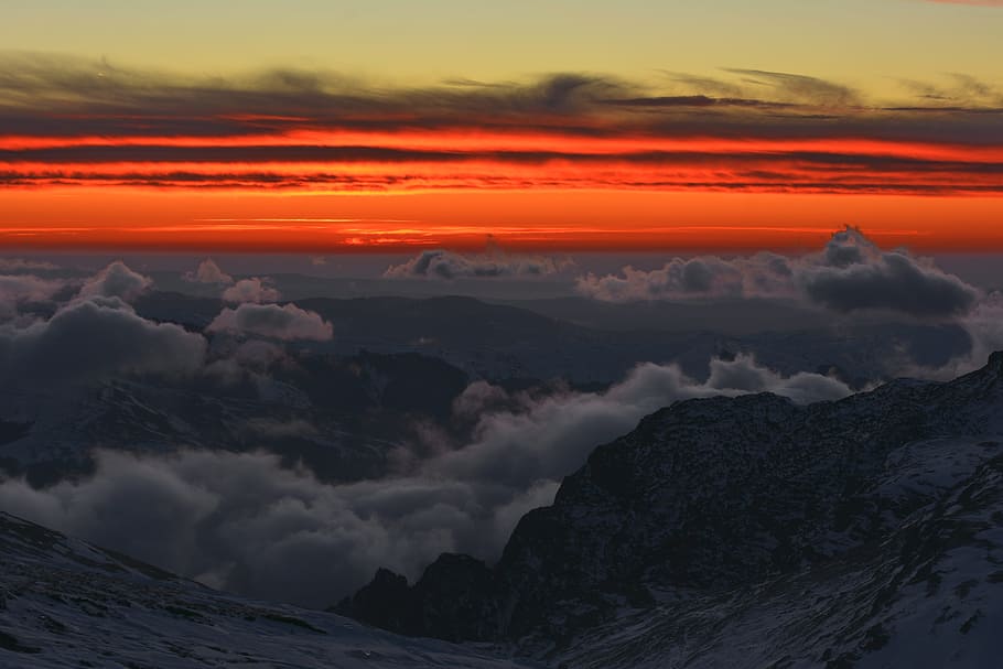 photo of cloudy sky over mountains during golden hour, clouds HD wallpaper