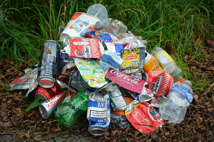 assorted-brand labeled can lot on brown soil, waste, garbage HD wallpaper