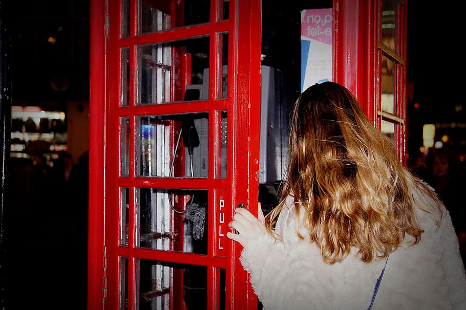 Pull, woman standing in front of red phone booth, telephone booth HD wallpaper