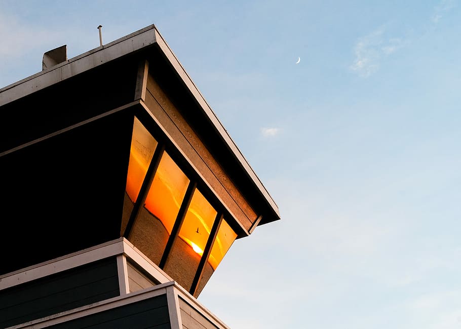 low angle photography of black building \, tower, sunset, reflection HD wallpaper