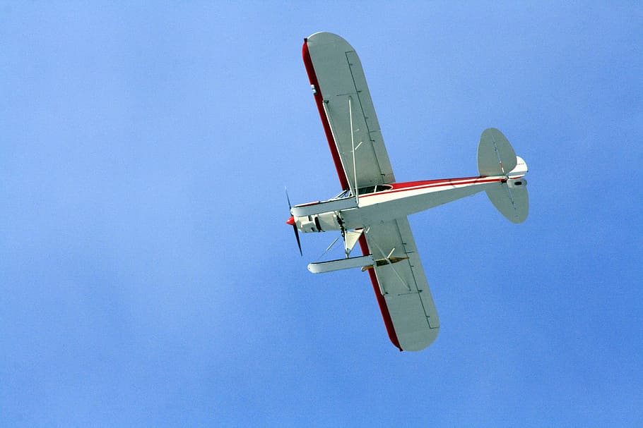 plane flying through the sky, high angle photography of airplane HD wallpaper