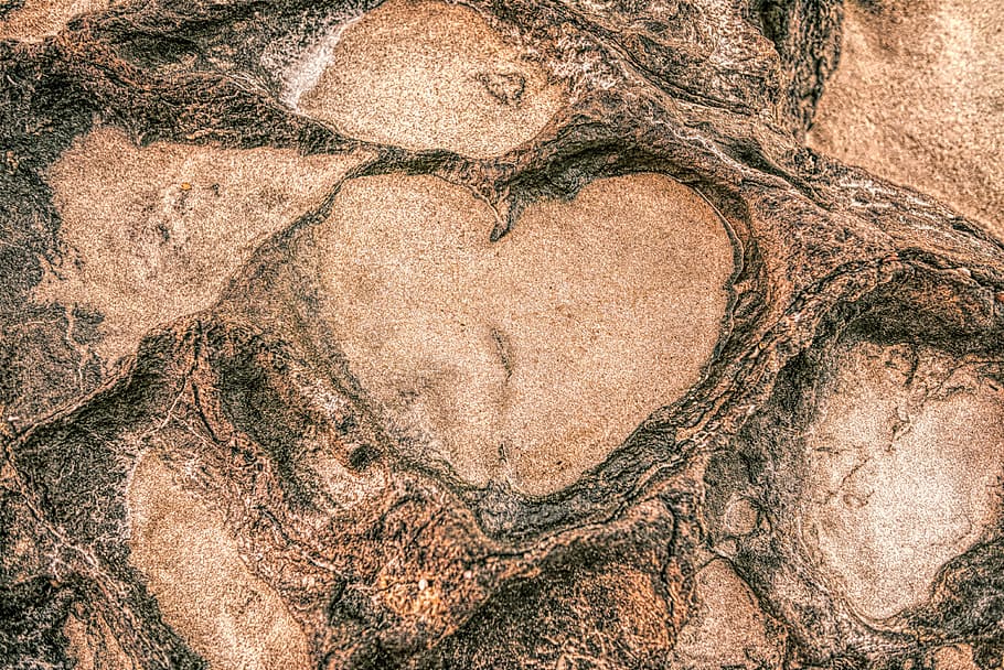aerial photography of brown and green land, rock, stone, heart HD wallpaper