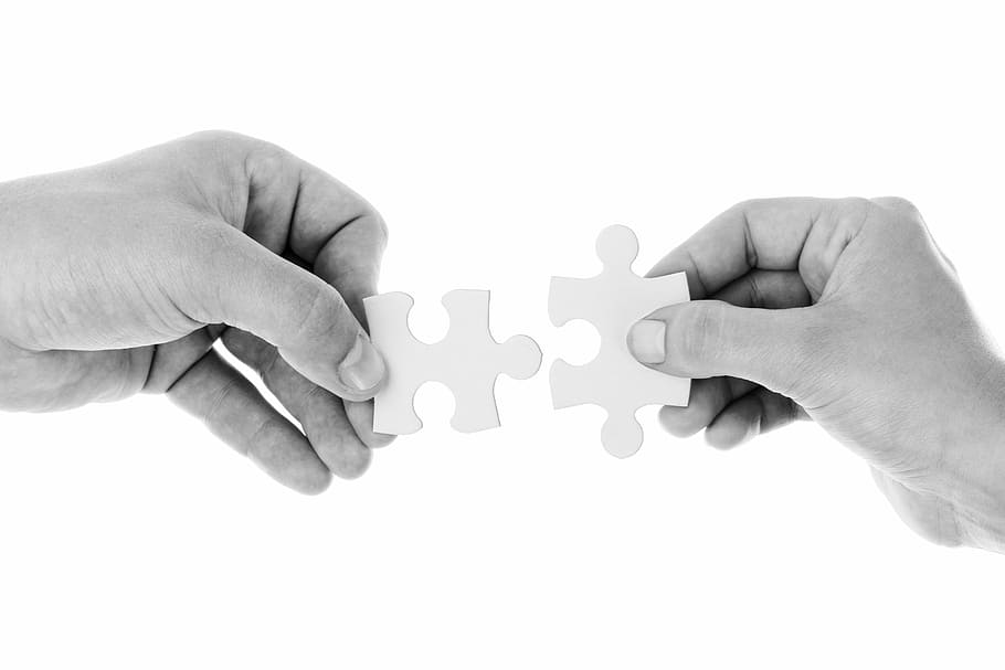 person holding jigsaw pieces, connect, connection, cooperation HD wallpaper
