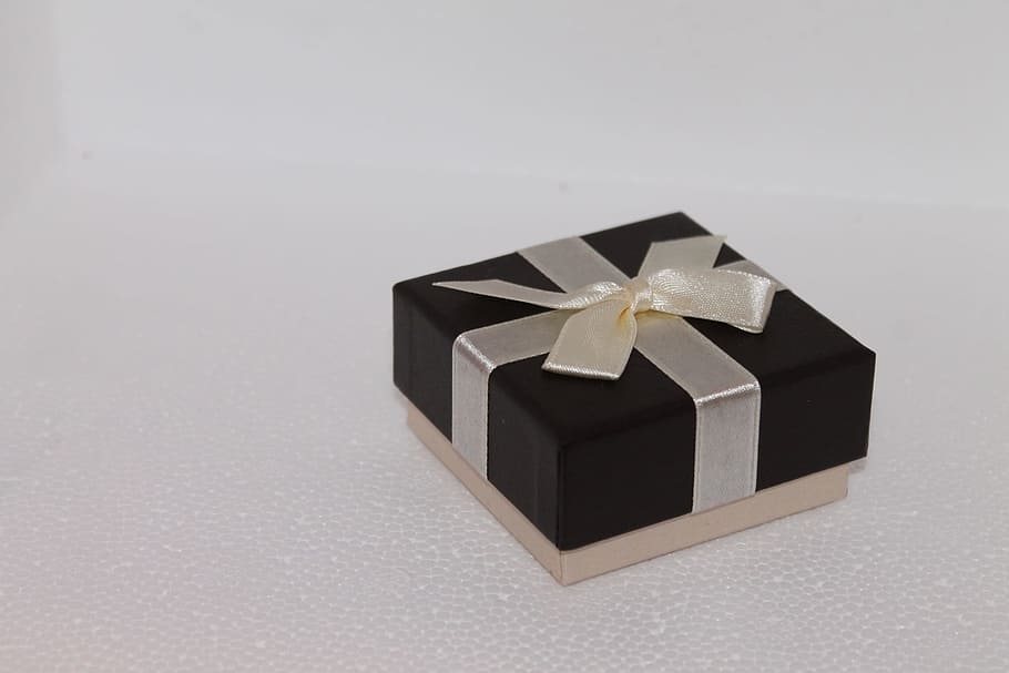 square black and brown bow accent gift box on white surface, gift packaging, HD wallpaper