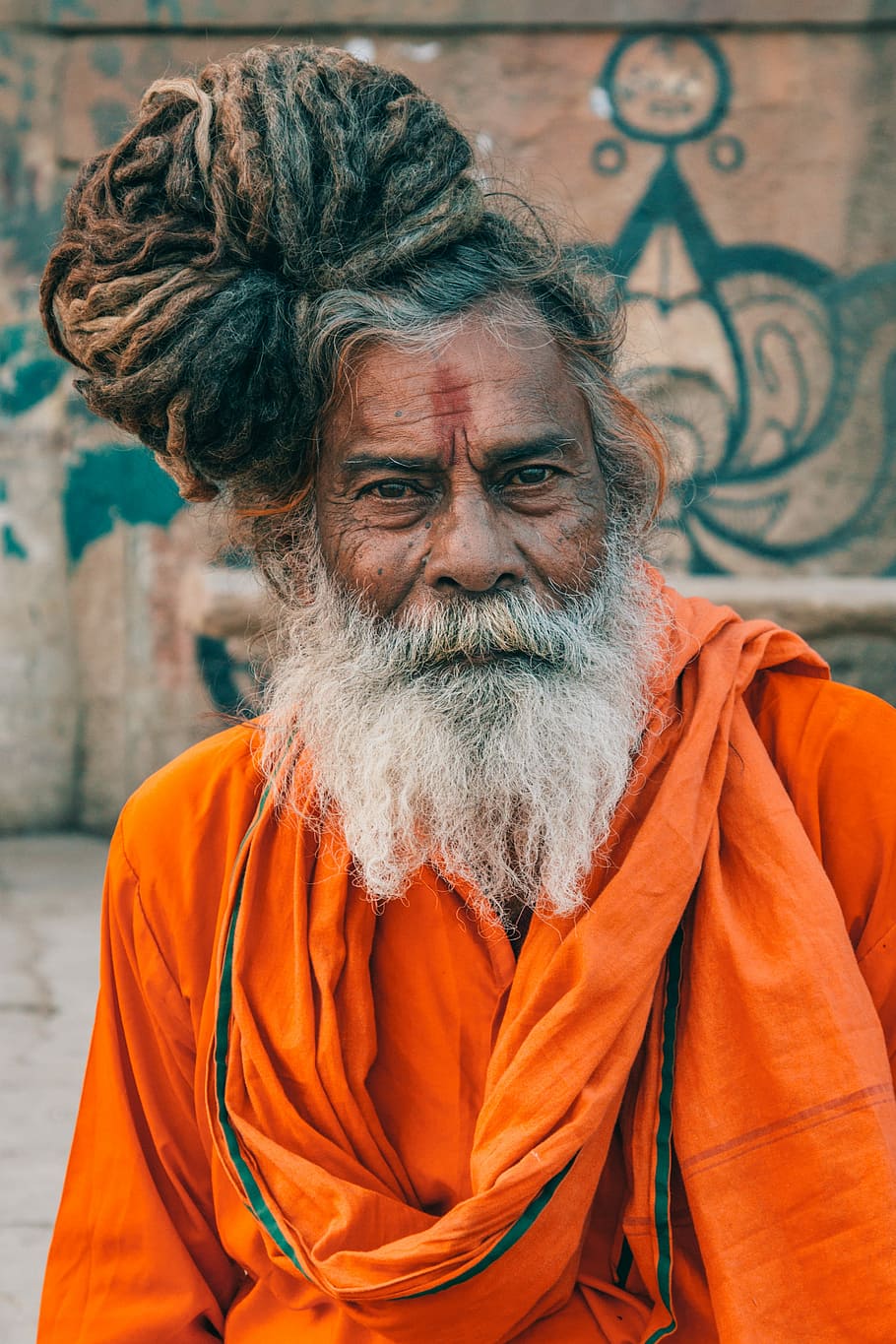 monk selective focus photography, photography of man in orange robe