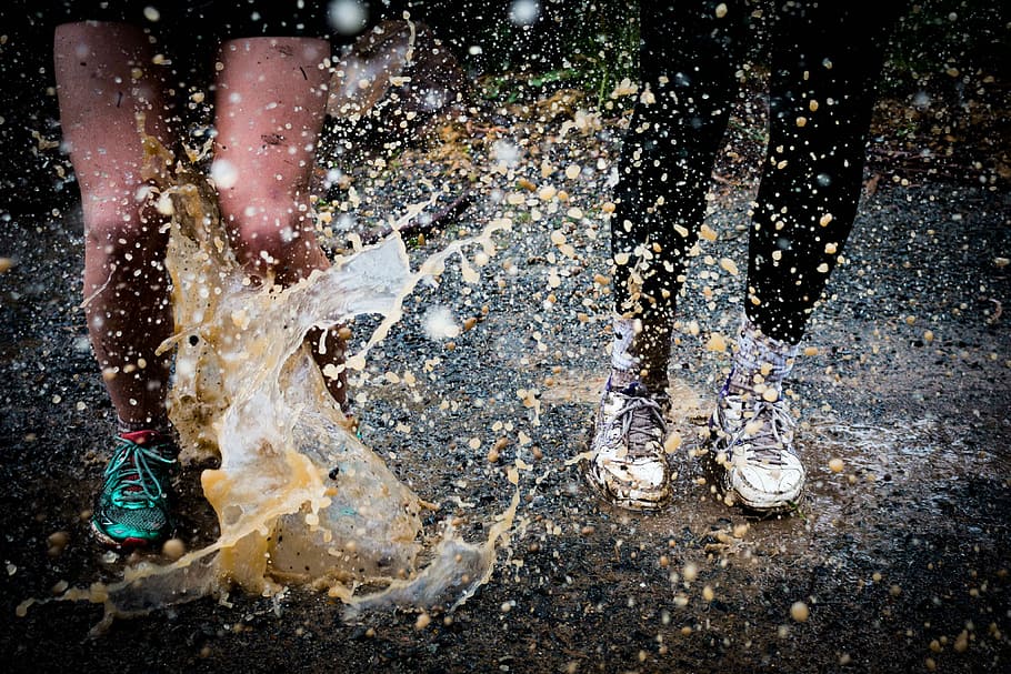 water splashing on two running people, two person stamping on flood water, HD wallpaper