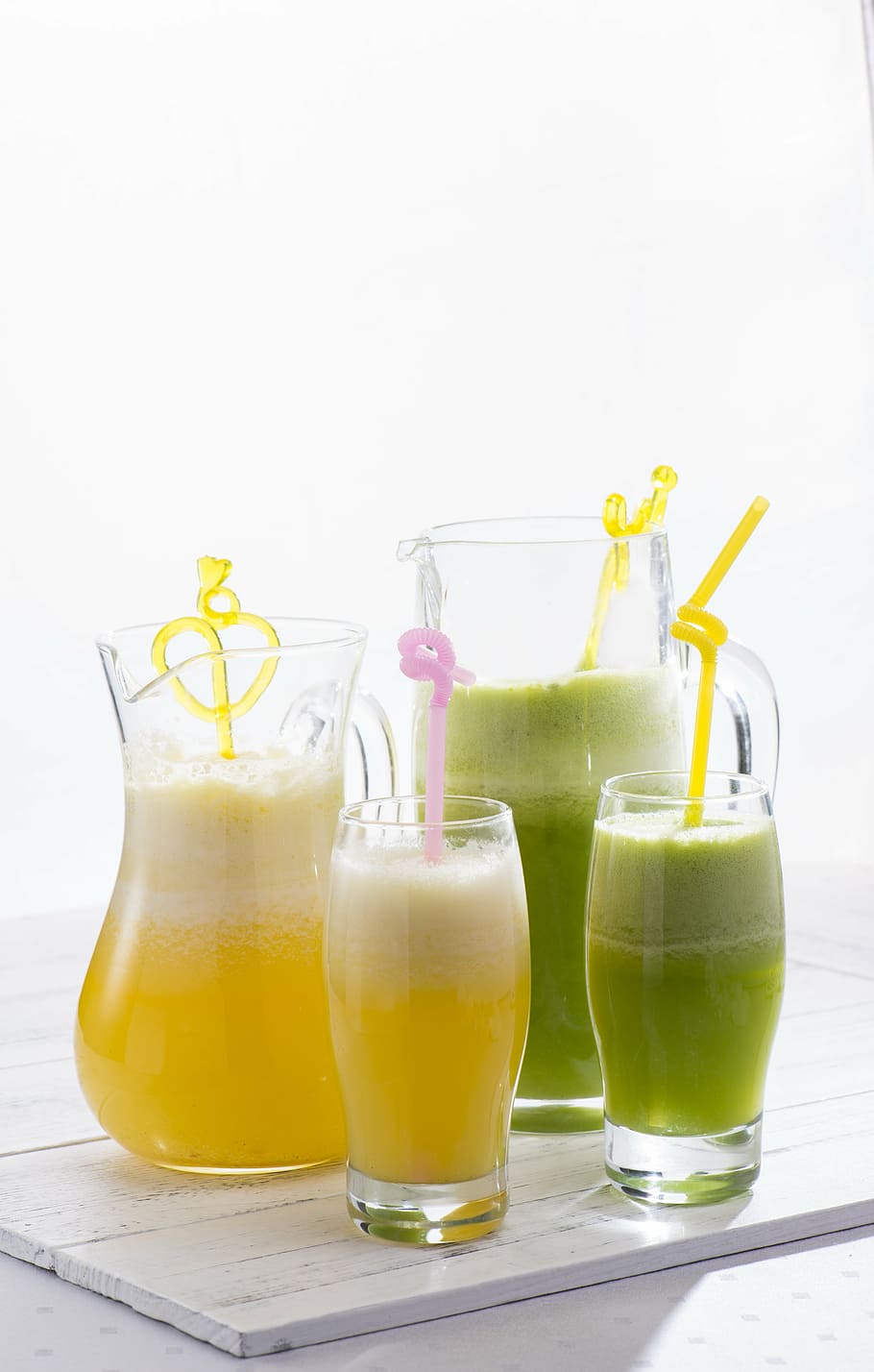 two clear glass pitchers beside clear highball glasses, fruit juice HD wallpaper