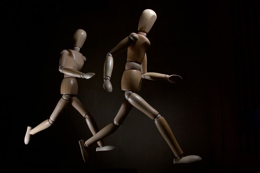 two running brown wooden stickmen, two brown wooden robot toys HD wallpaper