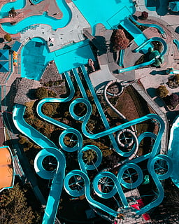 aerial view of slide swimming pool, high angle photography of swimming pool and long slide HD wallpaper