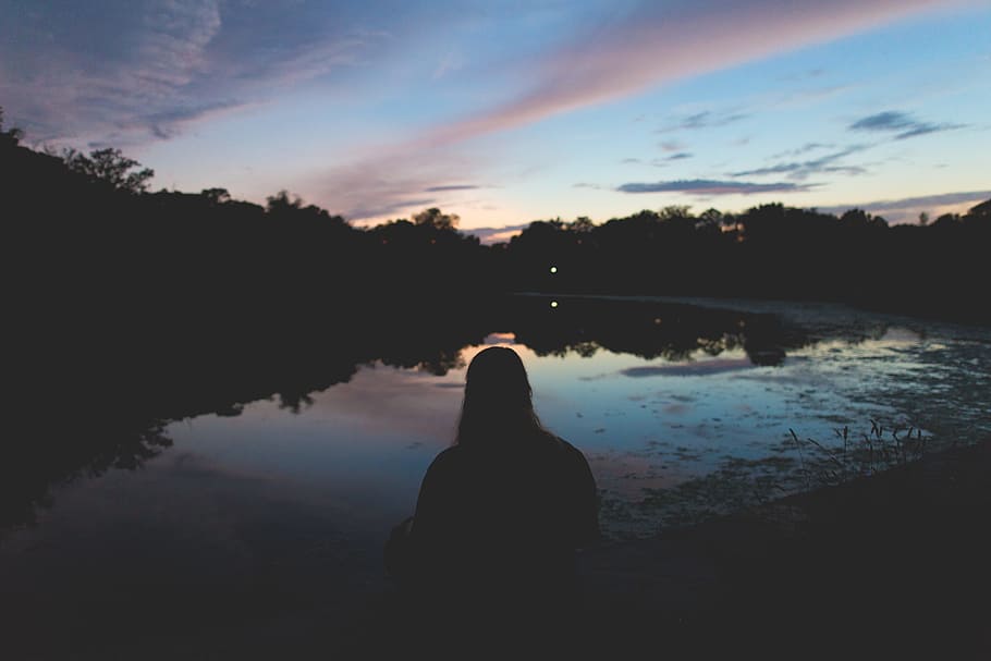 silhouette of person sitting near body of water, silhouette of person facing body of water HD wallpaper
