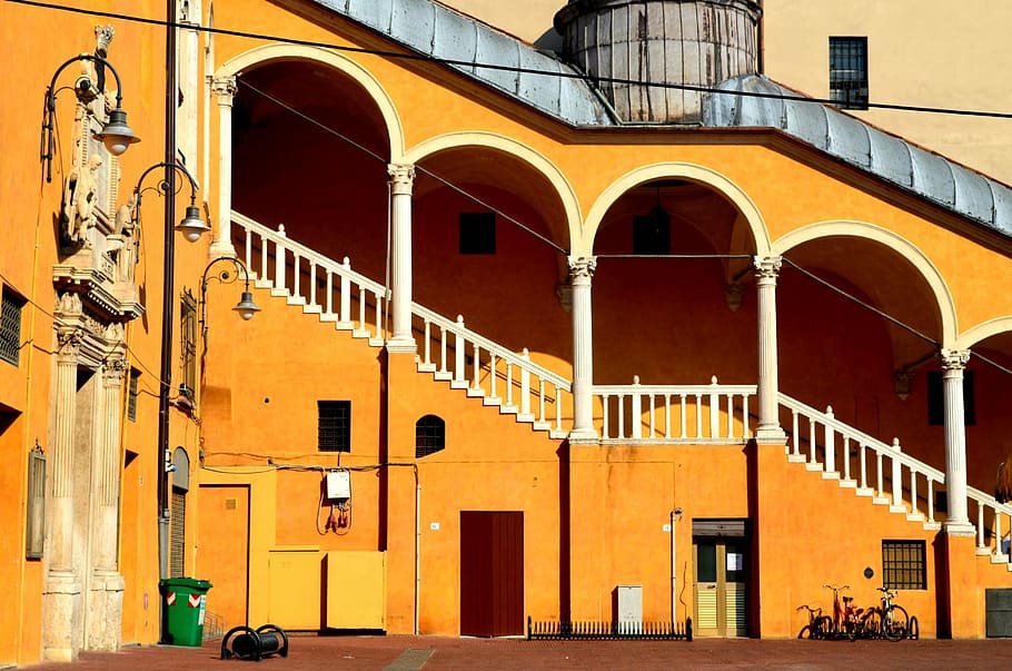 bicycle parked near establishment, orange building at daytime HD wallpaper