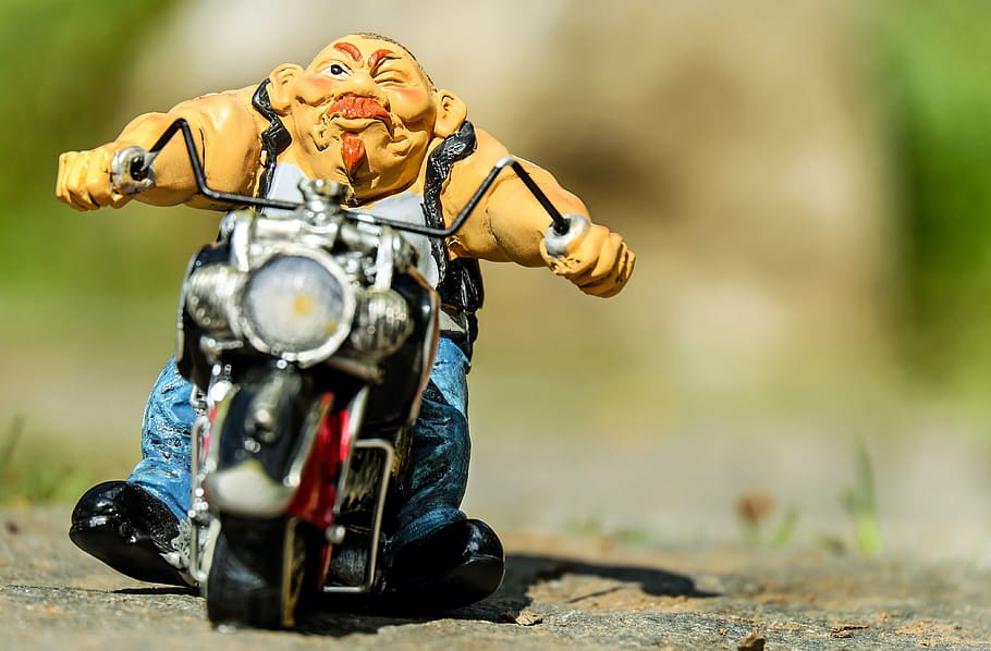 man riding on motorcycle die-cast model on sand, biker, figure, HD wallpaper