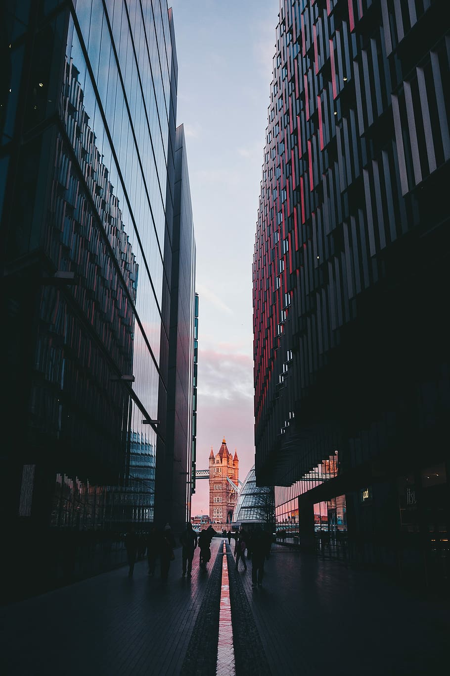 photo of people walking between two black buildings, skyscraper HD wallpaper