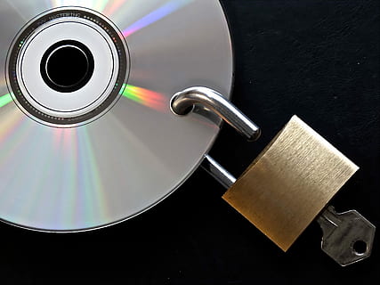 brass padlock with key hanging in gray disc, privacy policy HD wallpaper