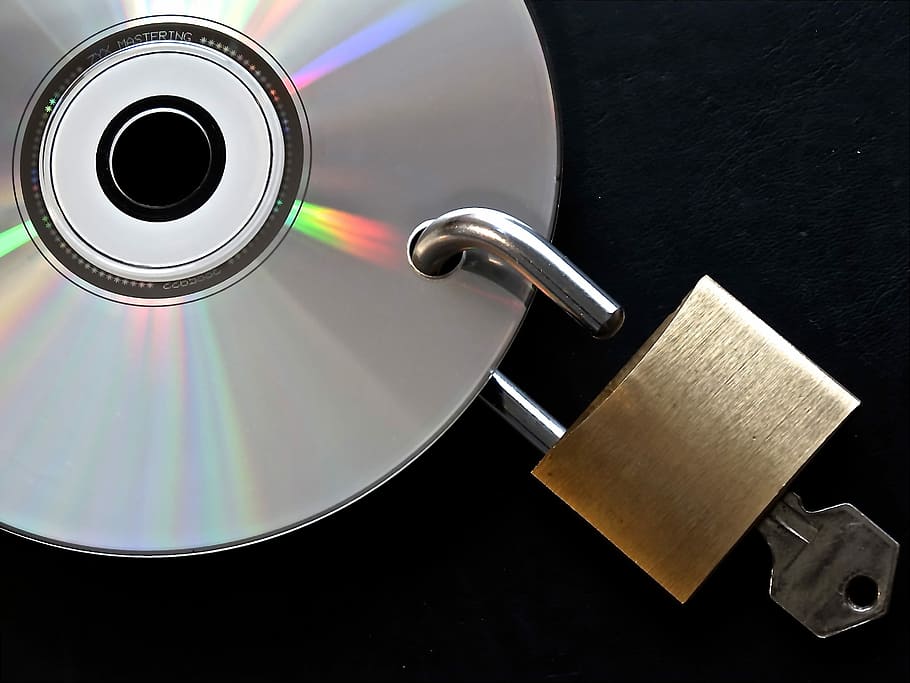 brass padlock with key hanging in gray disc, privacy policy HD wallpaper
