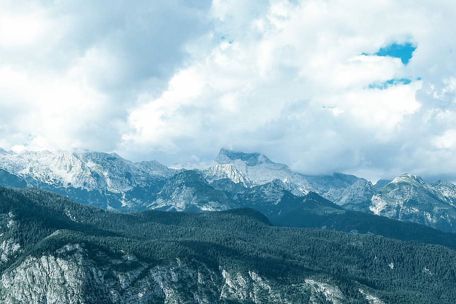 Mountains are calling, landscape photography of mountain range under cloudy sky HD wallpaper