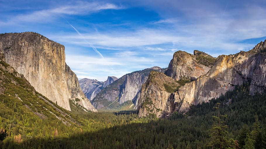 landscape photography of green grass field and mountains under cirrus clouds HD wallpaper