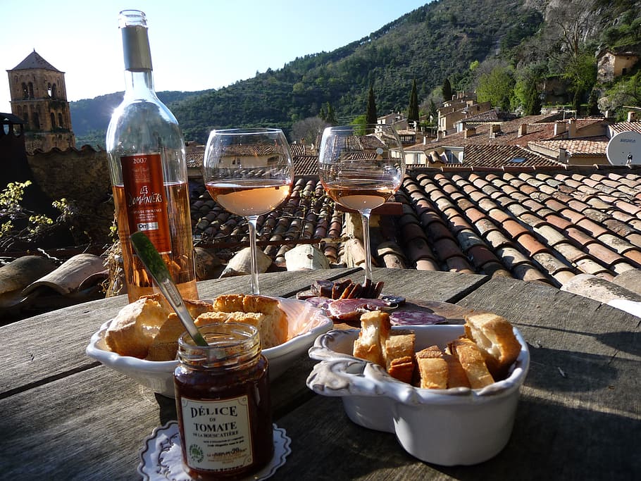 bowls of bread with two filled wine glasses, jam jar, and wine bottle HD wallpaper