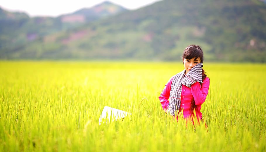 woman in pink coat on grass field, countryside, asian girl, female
