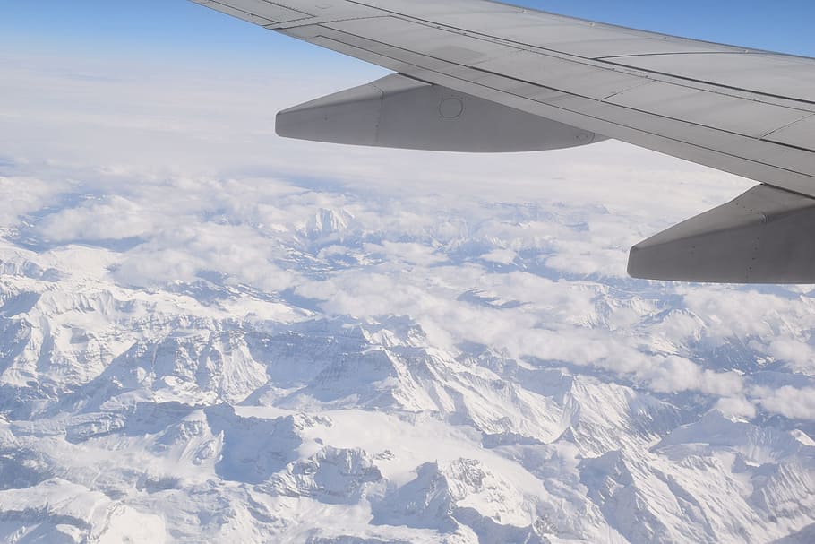 passenger plane flying over snow covered mountains, flight, sky, HD wallpaper