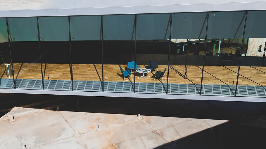 5-piece table and chairs on wooden floor near glass curtain, untitled HD wallpaper