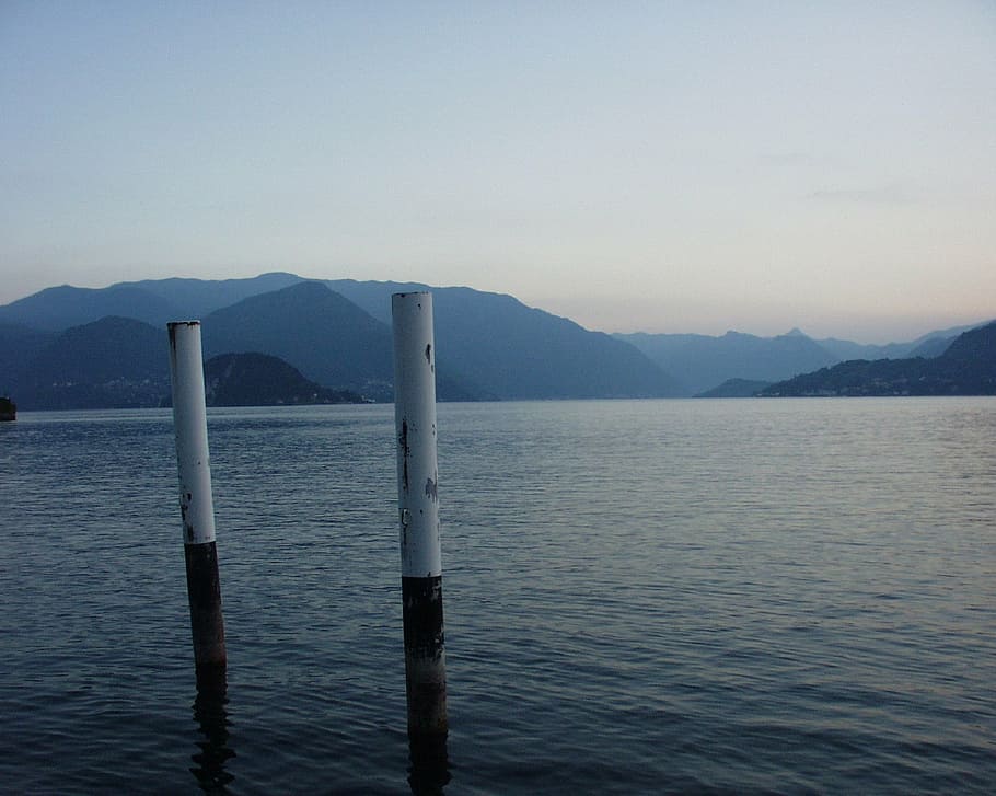 two white tubes underwater, lake como, calm, mountains, clouds HD wallpaper