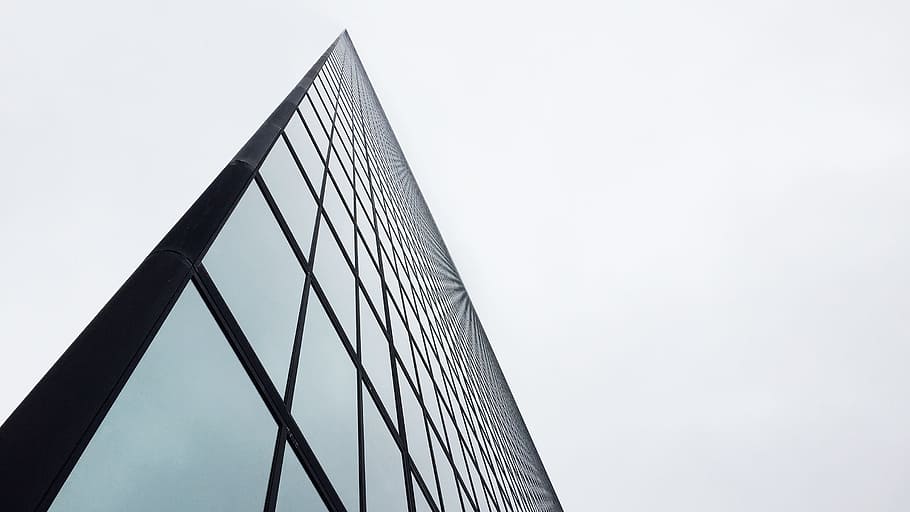 low-angle photography of glass building during daytime, low-angle photography of gray and black building HD wallpaper
