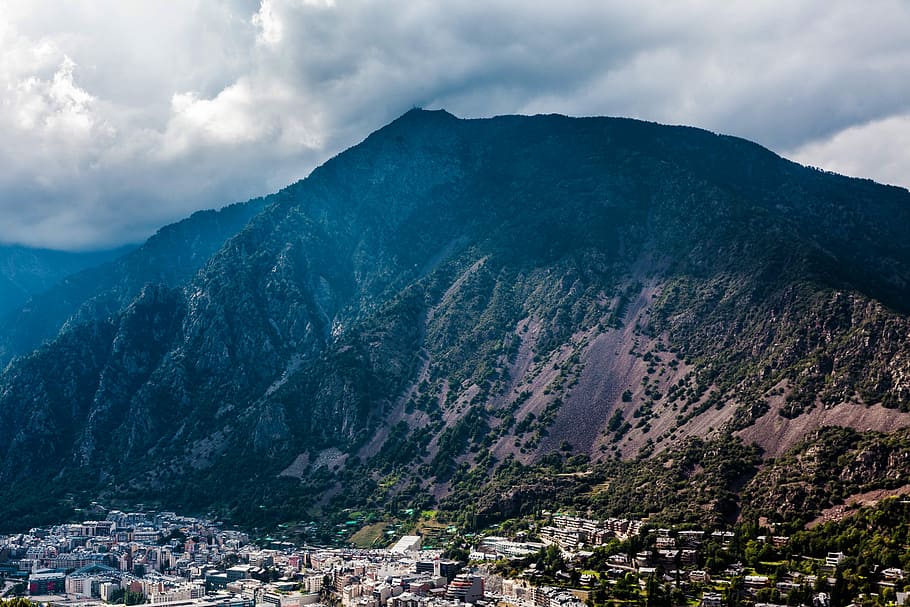 Landscape of the town of Andorre in the French Pyrenees , clouds HD wallpaper