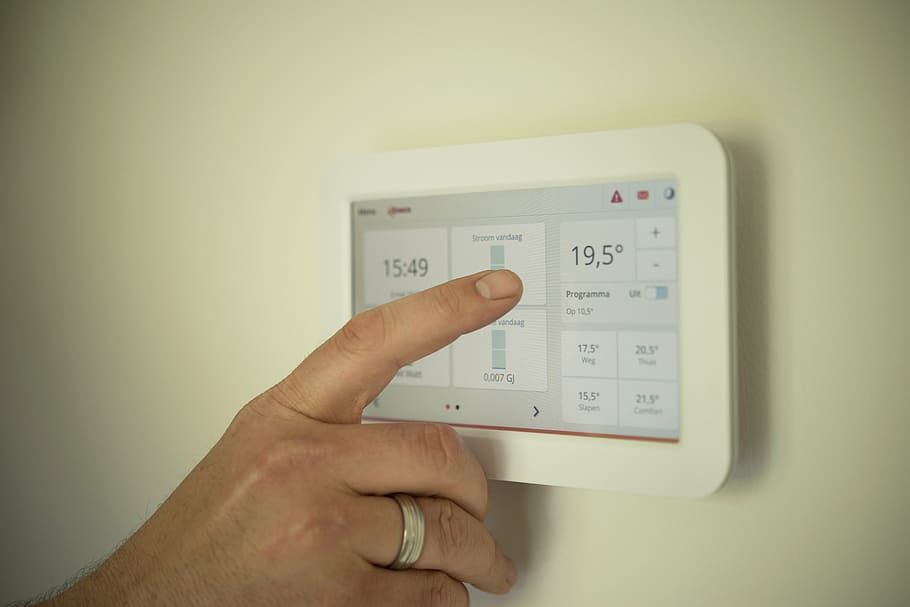white thermostat reading at 19.5, tablet, heating, man, pointing, HD wallpaper